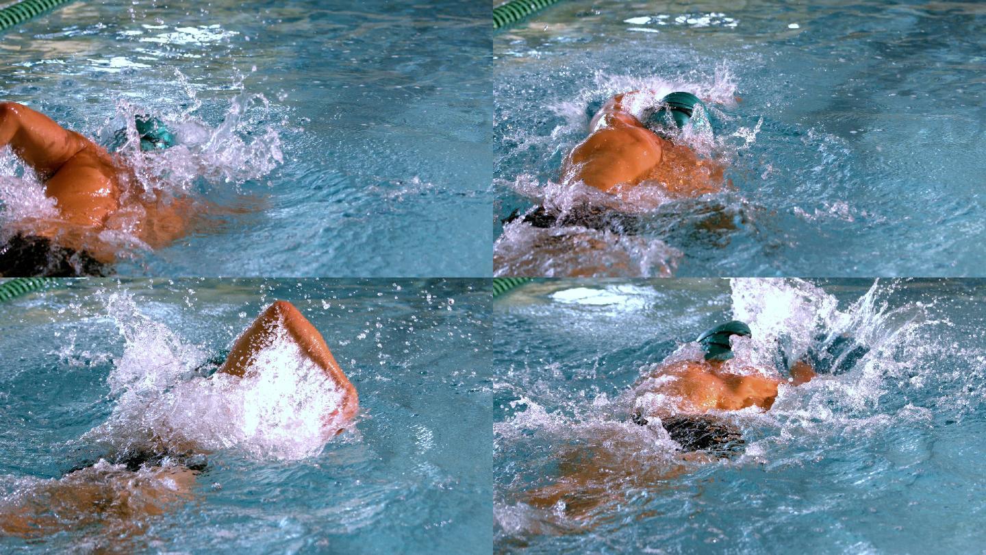 肌肉发达的游泳者在游泳池做缓慢的前划水