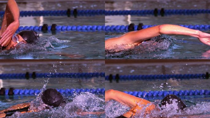 健康的游泳运动员在游泳池里用慢动作向前划水