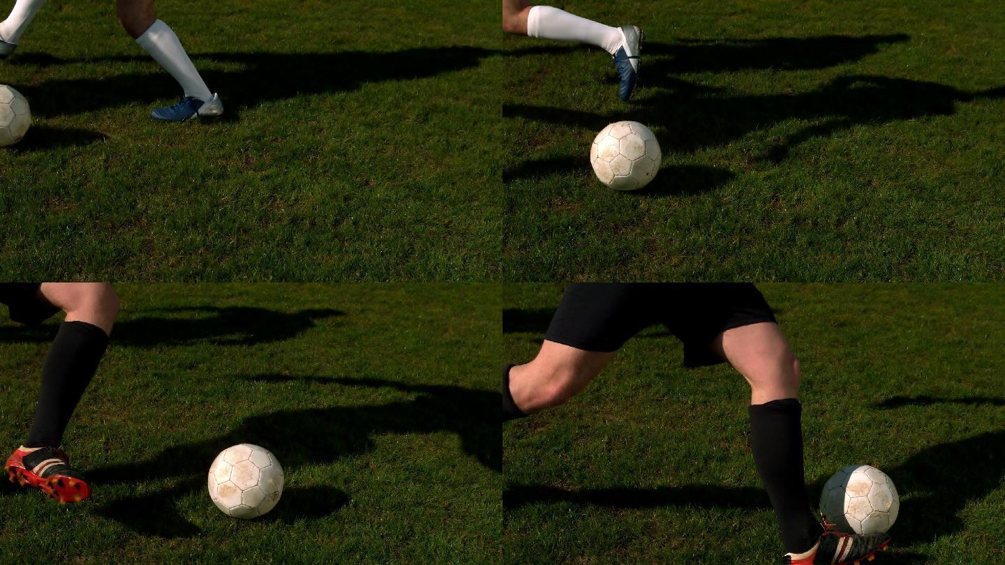 足球运动员在球场上以慢动作控制球