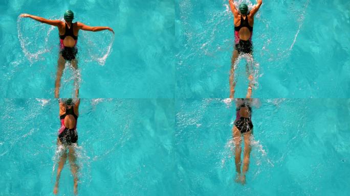 健康的女人在室外游泳池游泳在头顶的慢动作