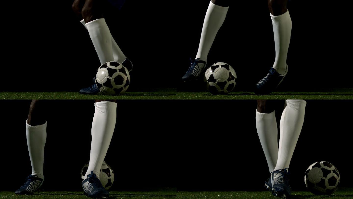 足球运动员在草地上以慢动作控制球