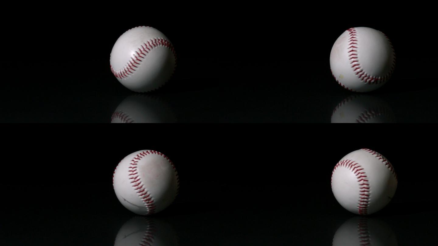 棒球在黑色的表面慢动作旋转