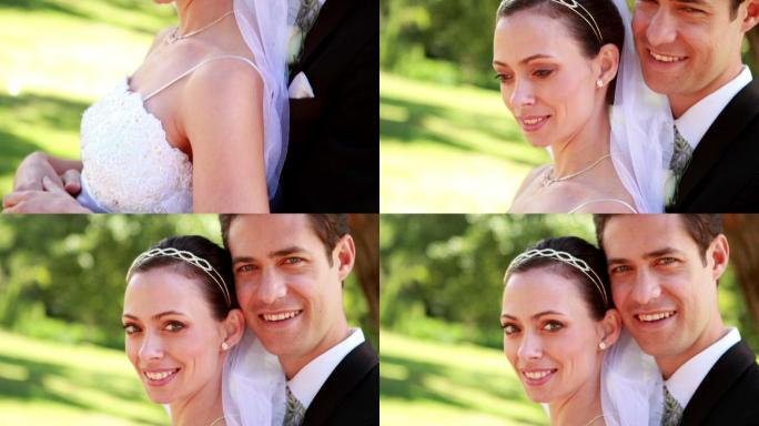 在一个阳光明媚的日子里，一对迷人的新婚夫妇在镜头前微笑着拥抱