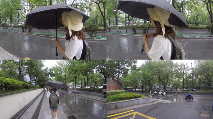 雨中打伞开开心心的女学生
