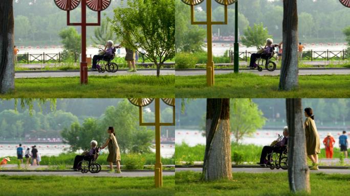 推着坐轮椅老人散步