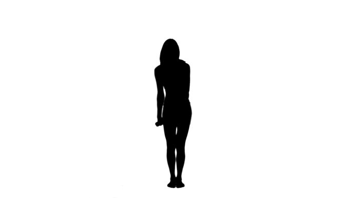 一个女人的剪影站着，在白色的背景下举起双臂