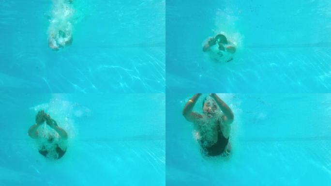 健身女子在室外游泳池的慢动作跳水