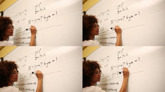 聪明的学生在大学的白板上解决数学问题