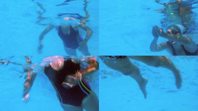 低角度视角的健康游泳者在游泳池做蛙泳