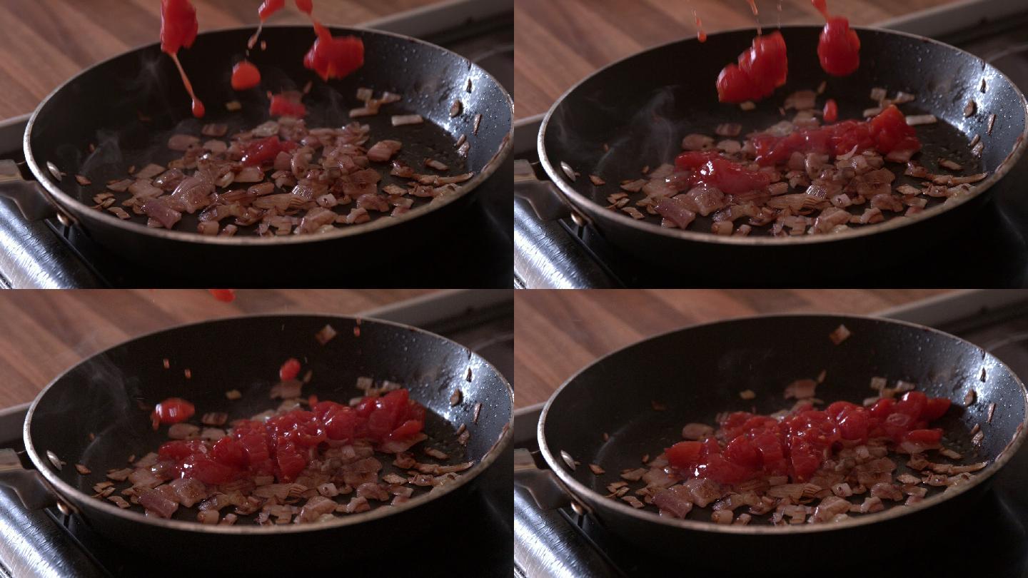 用慢动作将番茄酱倒入煎锅中