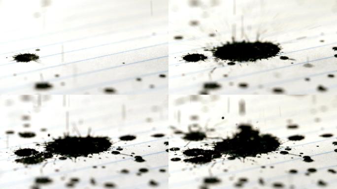 黑墨水缓慢地落在横格纸上