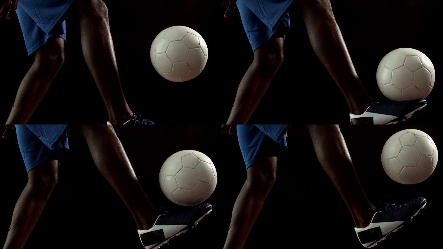 足球运动员用慢动作控制着球