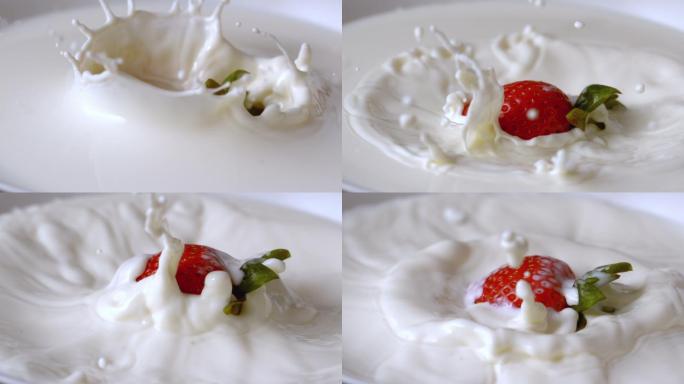 草莓掉在牛奶杯里的慢镜头