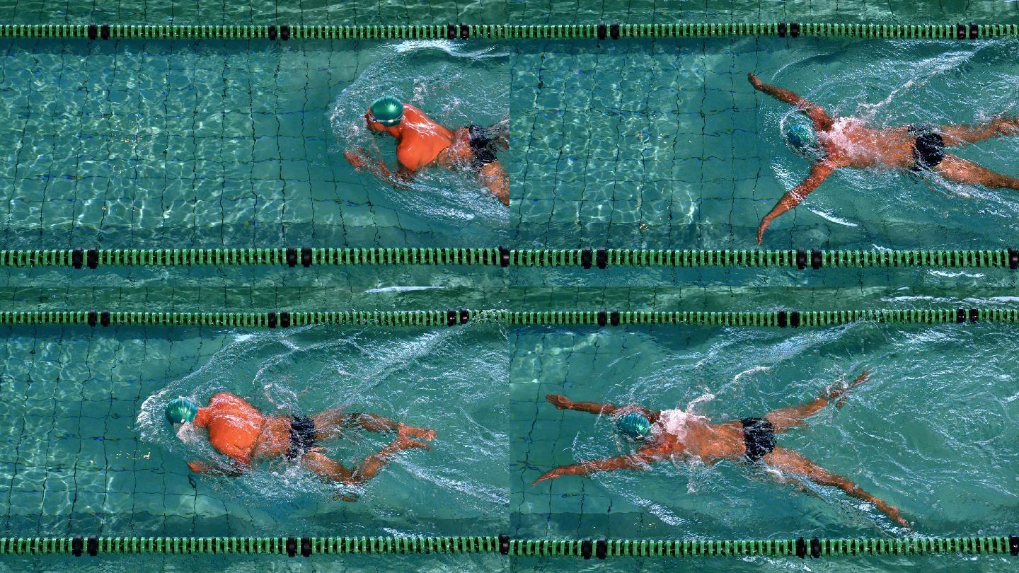 健康的游泳者在游泳池里用慢动作做蛙泳