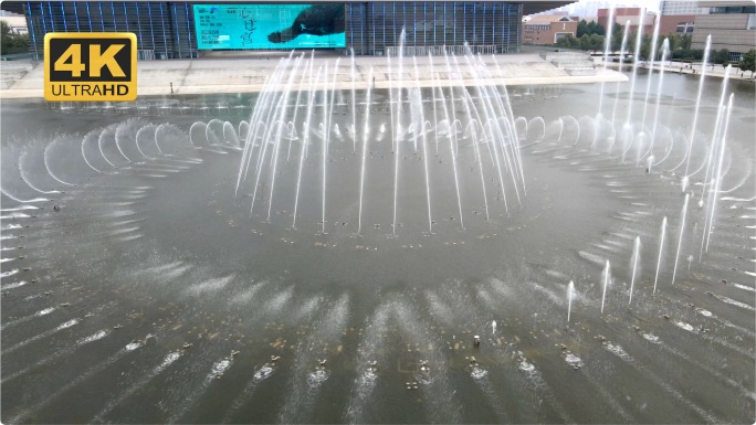 原创4K天津文化中心傍晚喷泉表演航拍