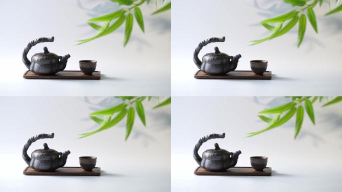 竹叶下的茶壶与茶杯