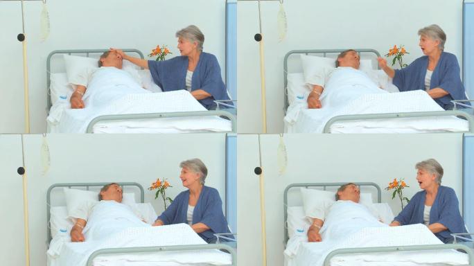 一位妇女到医院看望她生病的丈夫