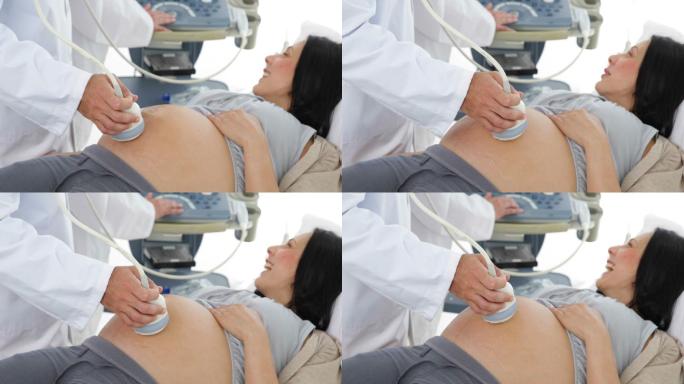 一个深褐色的孕妇正在医院的办公室里做超声波扫描