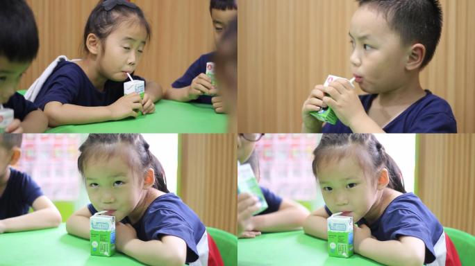 幼儿园孩子在教室喝牛奶