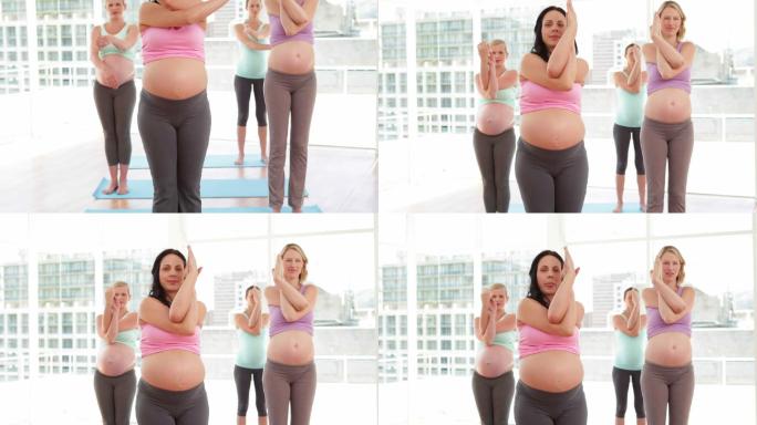 孕妇在健身房里做瑜伽