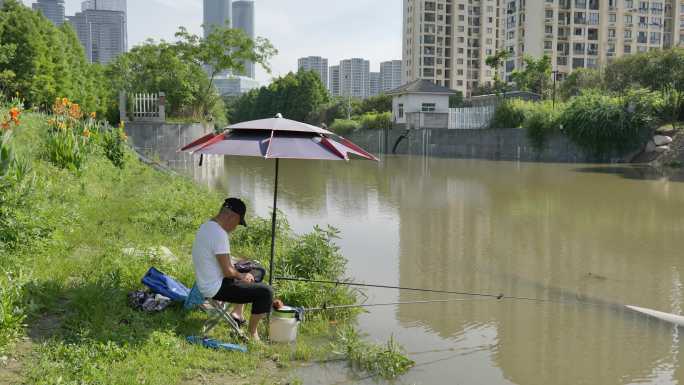 城市河边钓鱼的人