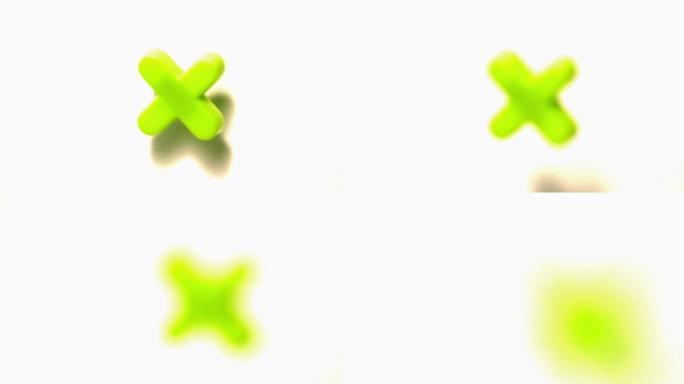 绿色字母x在慢动作中脱离白色背景