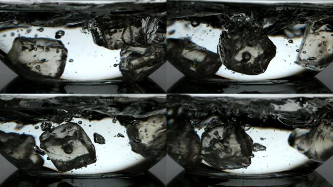 冰块在慢镜头中落入一碗水中