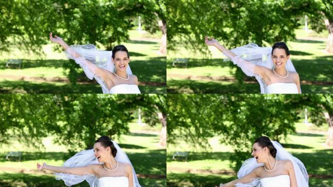 Beautiful bride throwing her bouquet on a sunny da