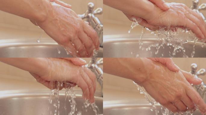 一个女人在水槽里慢镜头洗手