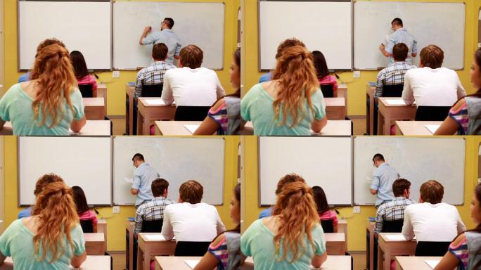 在大学课堂上，讲师在白板上写字