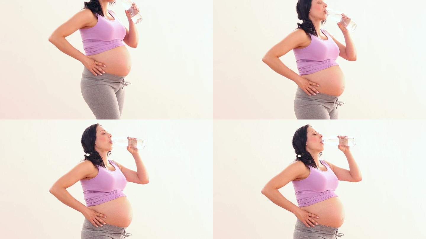一个西方孕妇喝水移镜头