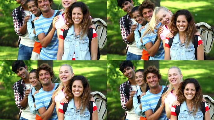 阳光明媚的日子里，快乐的学生们在镜头前一起微笑