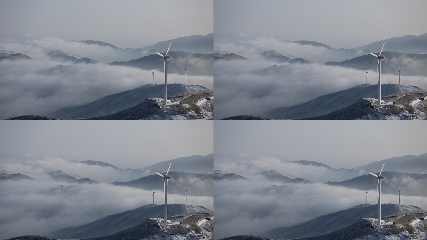 浙江东白山新能源风车风力发电冬天云海雪山
