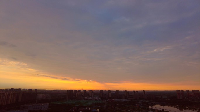 城市日出早晨朝霞风云变幻黎明曙光破晓