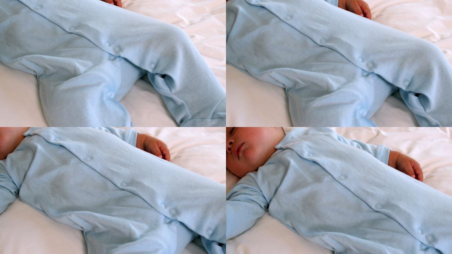 小男孩睡在床上的慢镜头