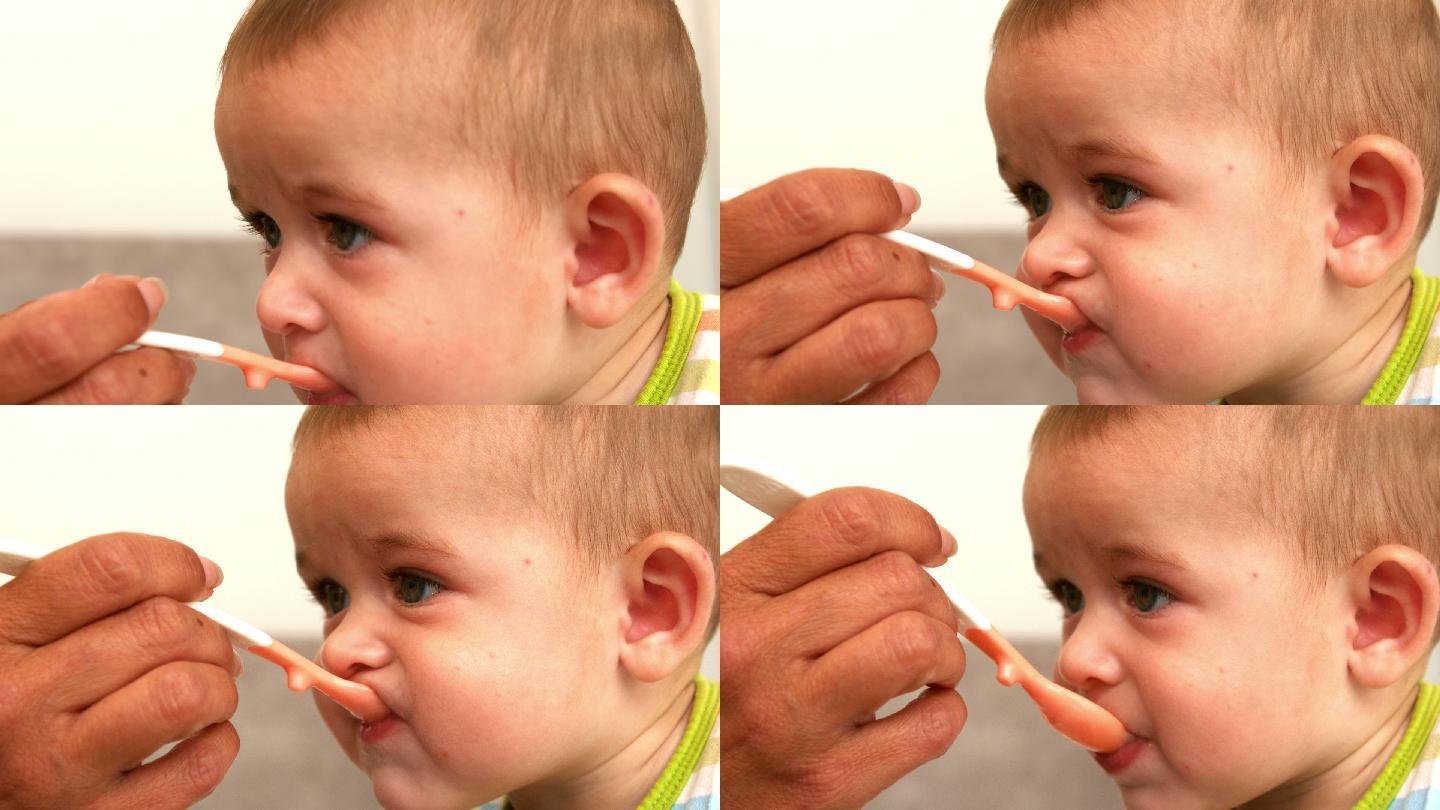 用慢镜头喂婴儿喂婴儿喂孩子吃饭招呼孩子