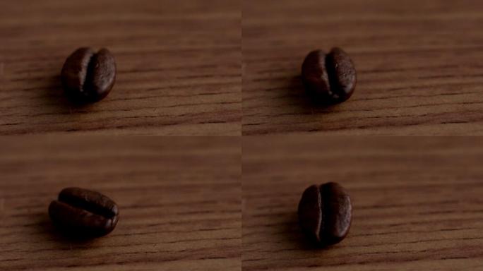 慢镜头中，咖啡豆在木质表面上旋转