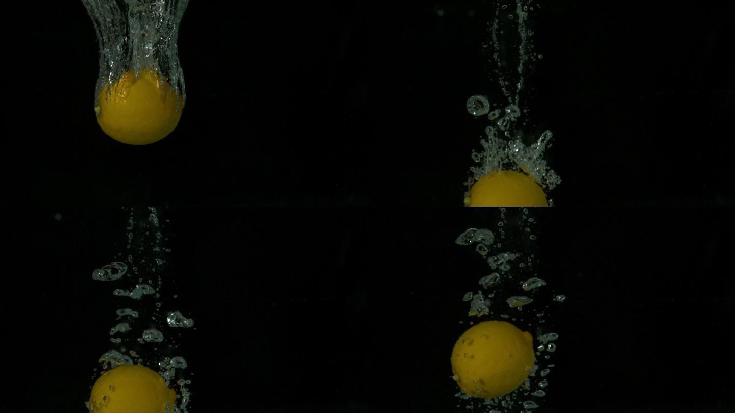 在黑色背景慢镜头中，柠檬跳入水中