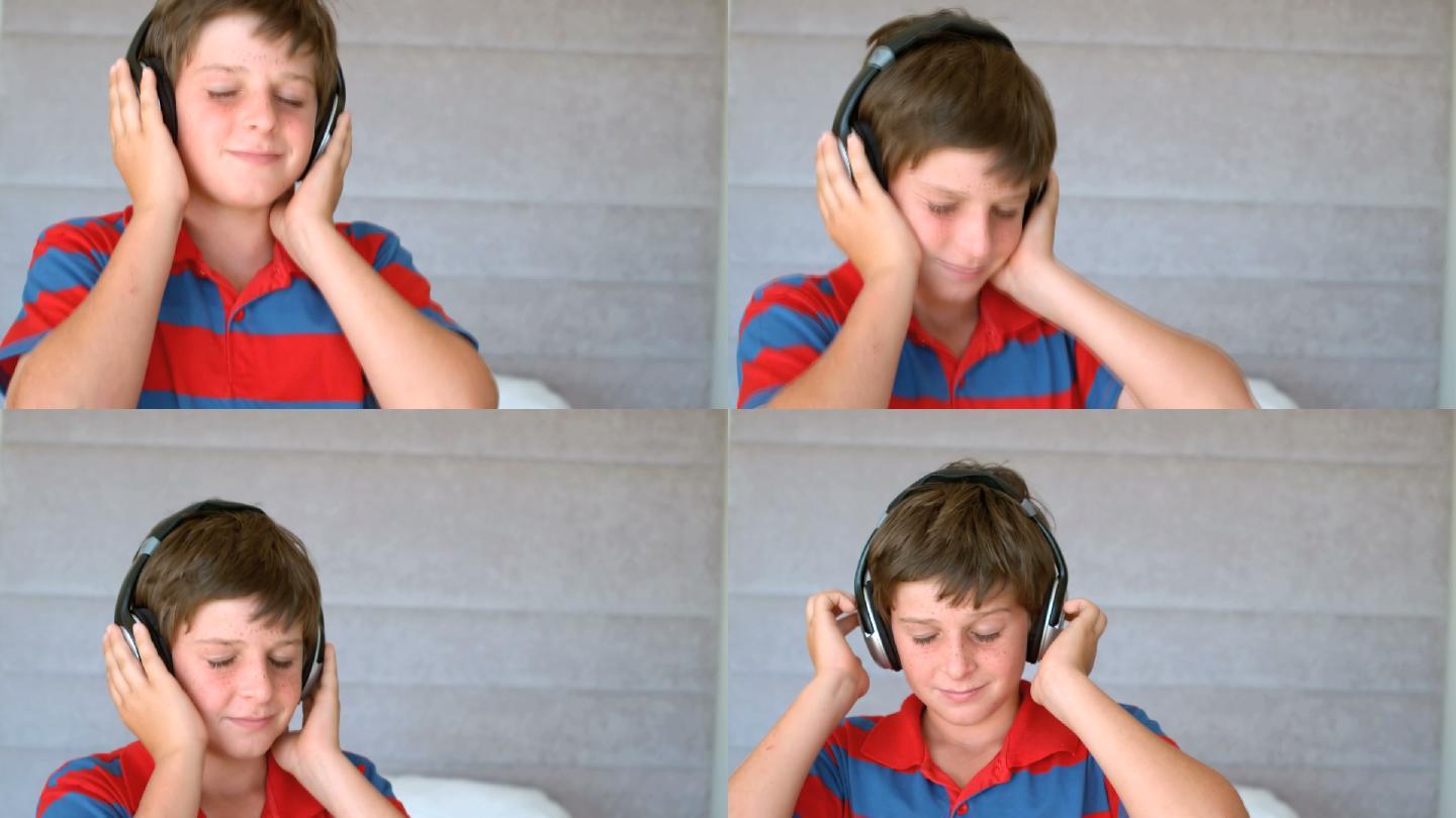 跳舞的小男孩戴着耳机，以每秒250帧的慢动作欣赏音乐