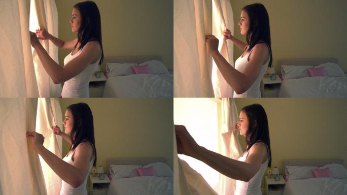 清晨，年轻女子拉开卧室的窗帘，慢镜头