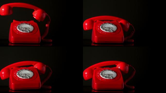 红色电话的听筒器掉落在电话上特写
