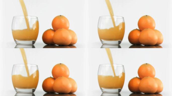 橙子和倒橙汁特写倒橙汁果汁展示