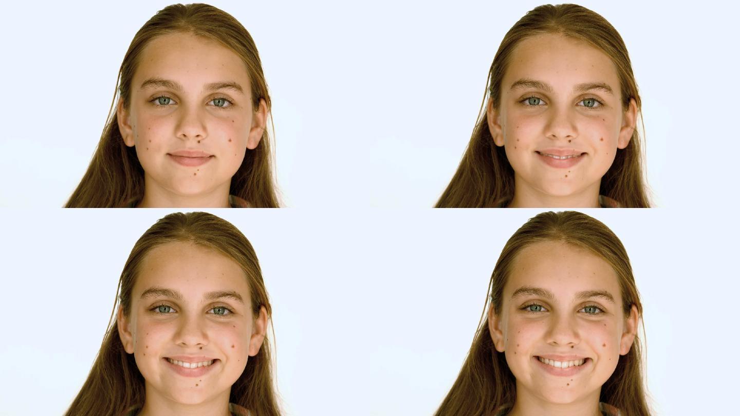 女孩对着白色背景微笑的慢镜头，每秒500帧