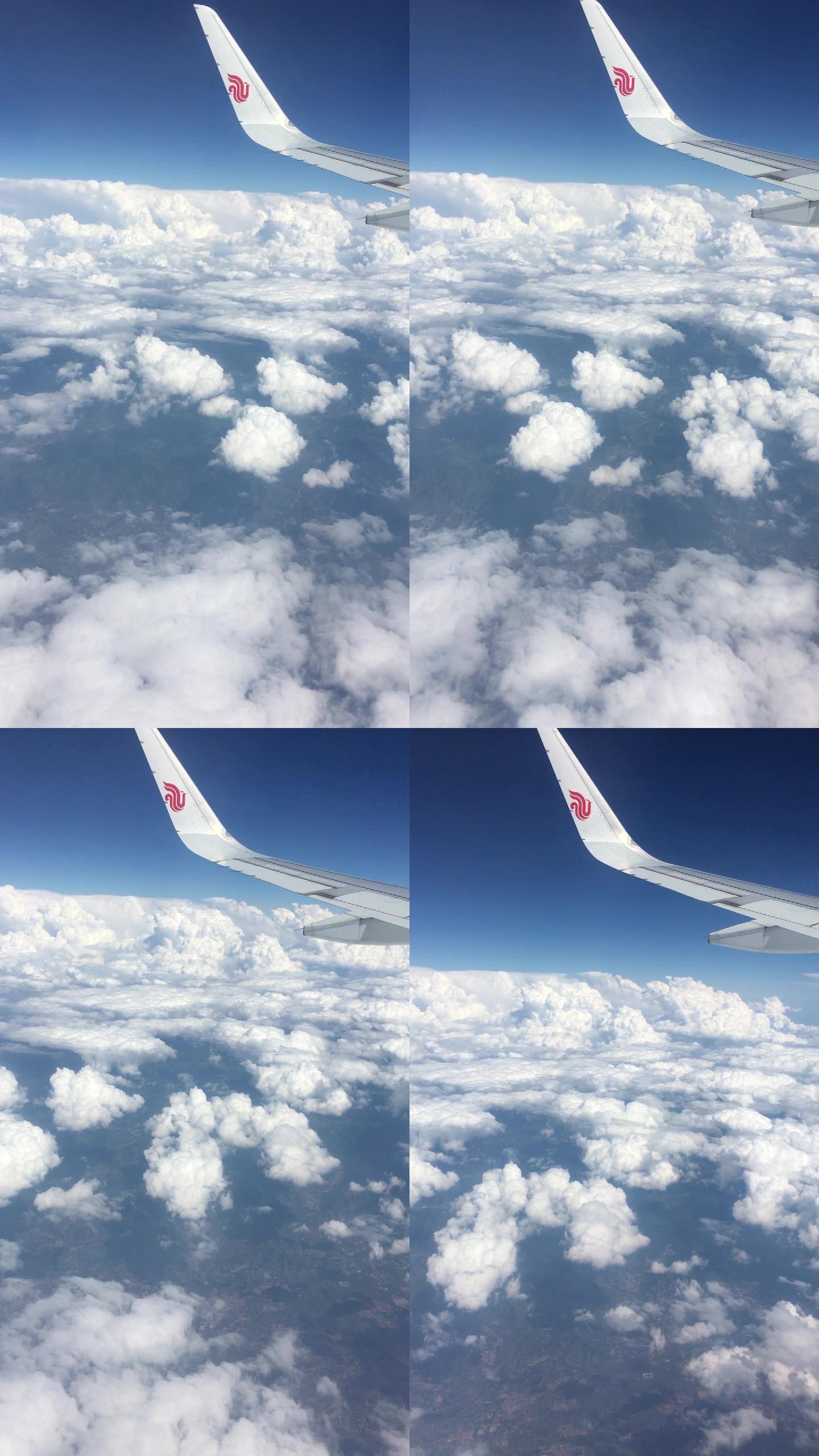 视频素材.飞机舷窗外的云朵竖版