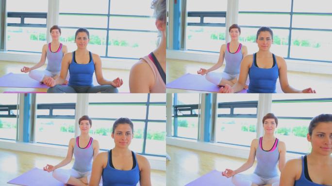 女人们在瑜伽房里做瑜伽特写