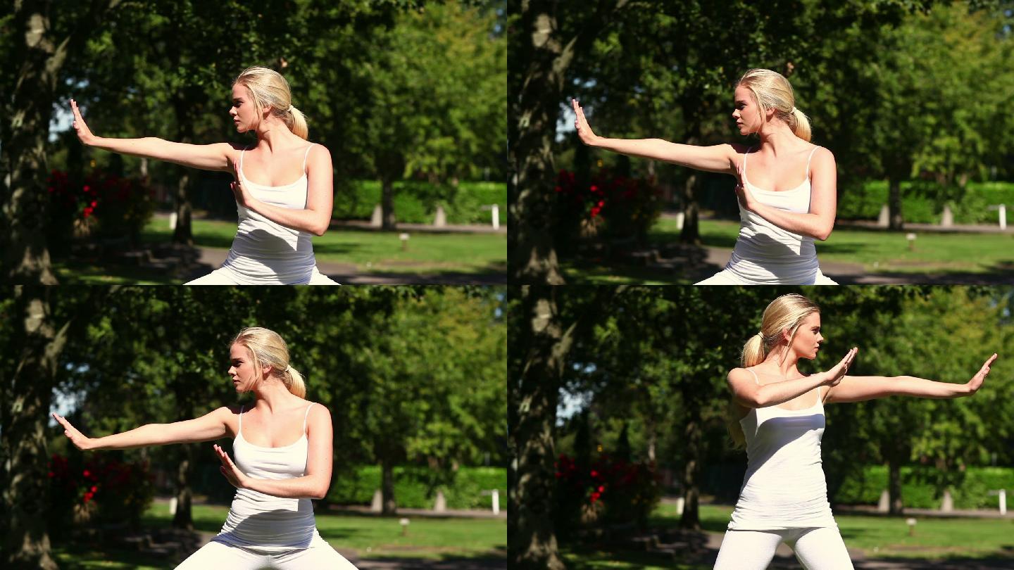 一个白人女性在公园里打太极