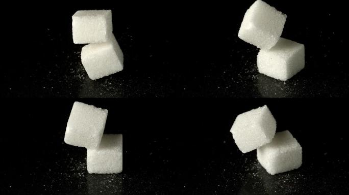 方糖掉落在糖粉上特写