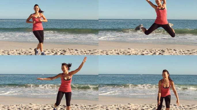 在海滩上锻炼的快乐女人的慢镜头