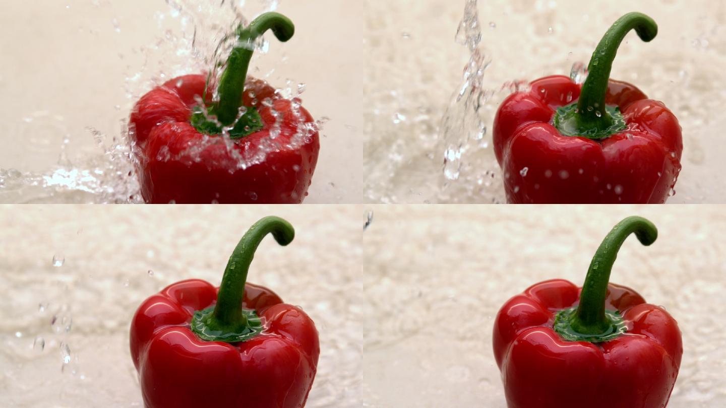 慢镜头中，水倒在红辣椒上
