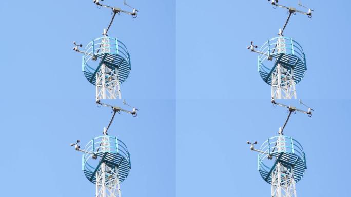 蓝天下气象站台的气象监测仪铁塔仰拍